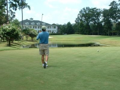 Tee shot on #9 a picturesque par , I believe modeled on Augusta National #16.  My tee shot was over the water but short of the green.  I was satisfied with bogey here.