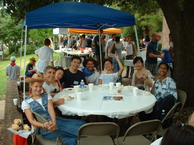 Here's our first table.  Students from China and India.  Kelly Brown, ISFM leader, in the hat and bandana.  Emily is on the left.