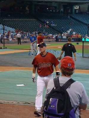Craig Biggio, Astros legend and latest member of the 3000-hit club, returns to the dugout after fielding practice