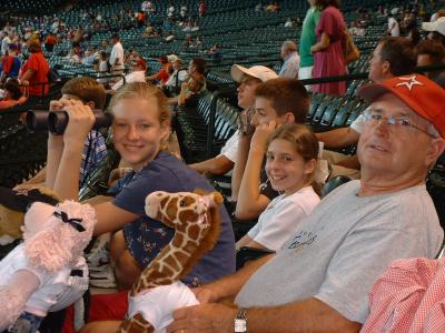 Emily spies the Astros while Kate and Dad look on