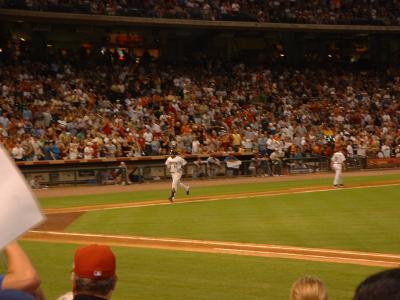 Carlos Lee hit a home run, here he comes trotting past 3rd