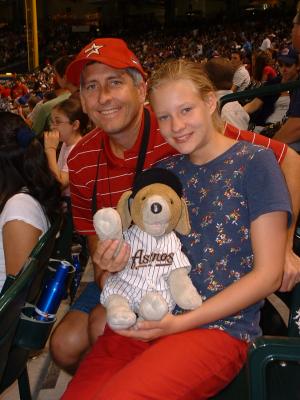 Emily and I (and Bud in full Astros regalia) enjoy a great game