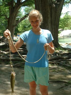 Emily caught a good size bass Emily caught a good size bass